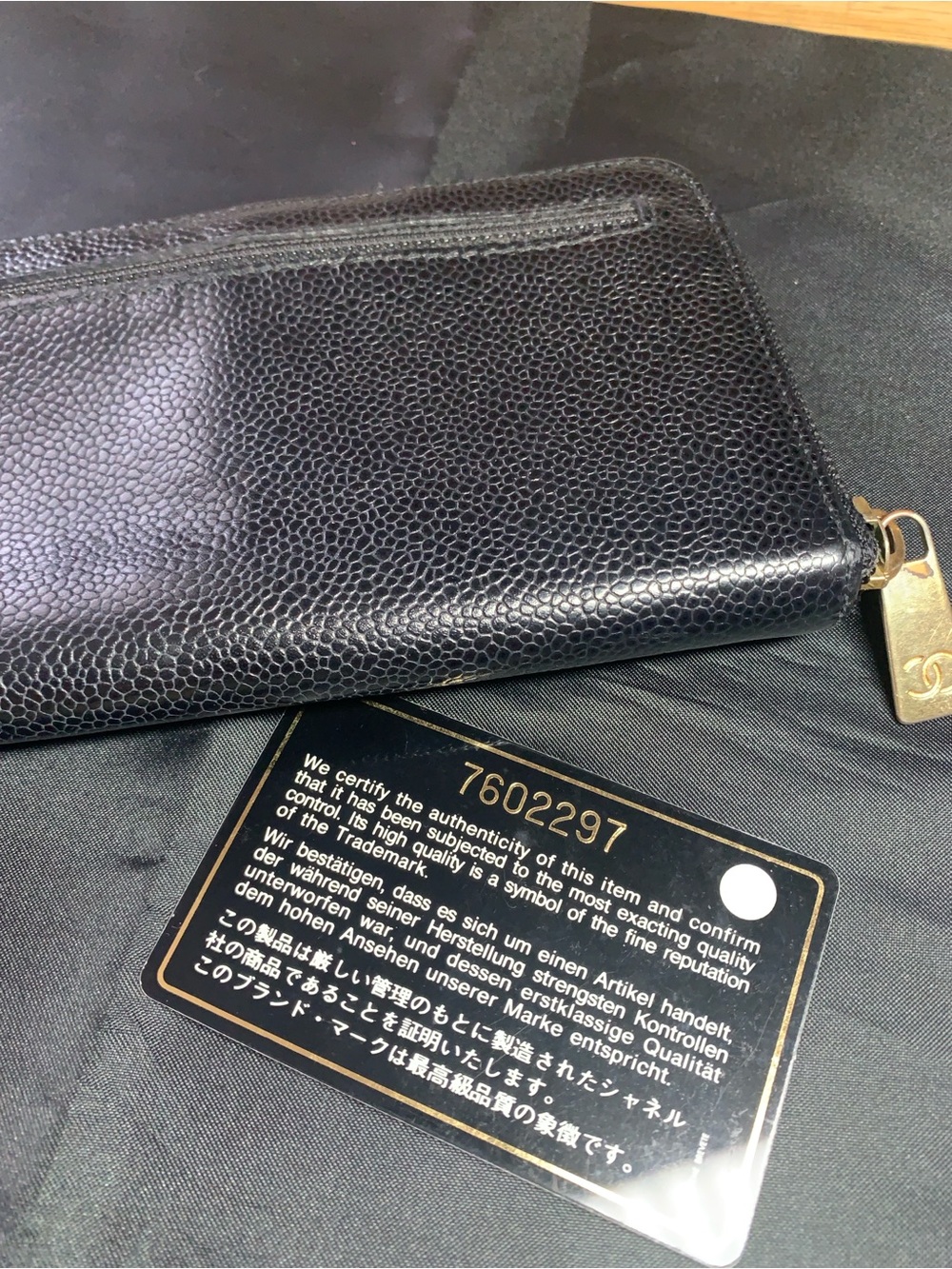CHANEL Black Pebbled Leather Zip Wallet with Gold Pull - Picture 4 of 17